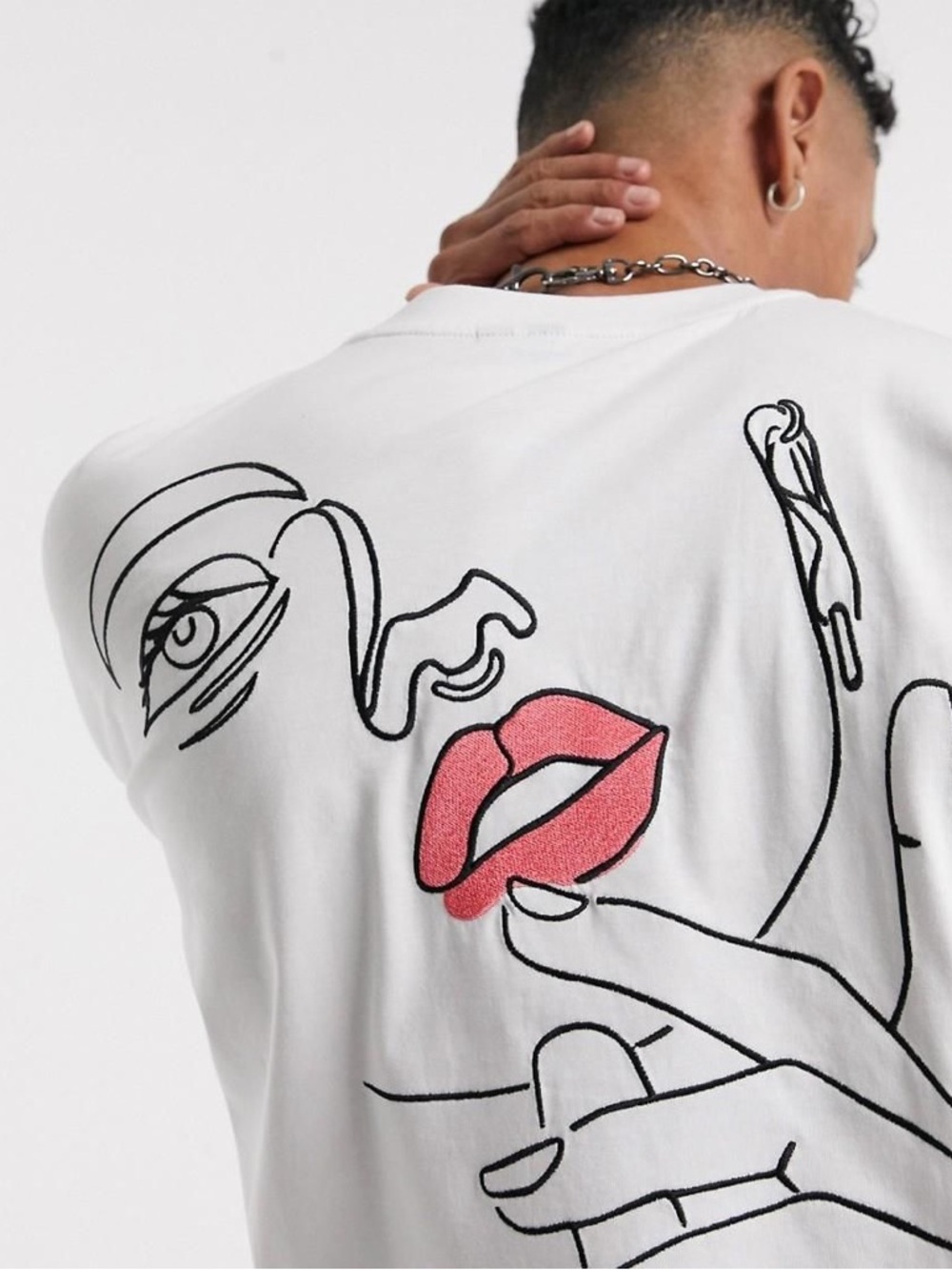 White Graphic Tee with Abstract Face and Pink Lips